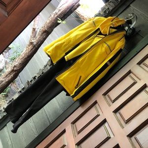 Nils yellow snowboarding jacket, matching headband,Marker one piece pants suit!